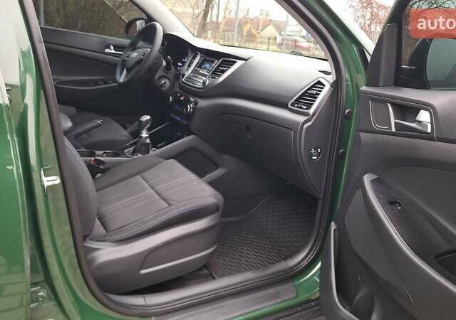 Зелений Хендай Туксон, об'ємом двигуна 2 л та пробігом 218 тис. км за 16999 $, фото 26 на Automoto.ua