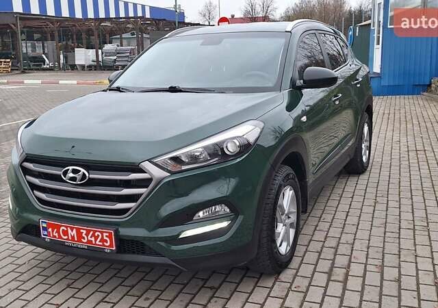 Зелений Хендай Туксон, об'ємом двигуна 2 л та пробігом 218 тис. км за 16999 $, фото 13 на Automoto.ua