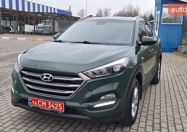 Зелений Хендай Туксон, об'ємом двигуна 2 л та пробігом 218 тис. км за 16999 $, фото 11 на Automoto.ua