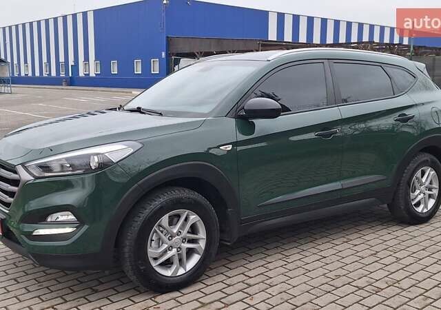 Зелений Хендай Туксон, об'ємом двигуна 2 л та пробігом 218 тис. км за 16999 $, фото 4 на Automoto.ua