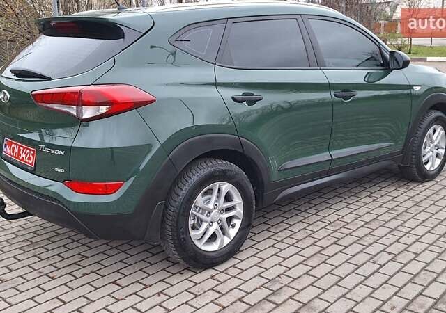 Зелений Хендай Туксон, об'ємом двигуна 2 л та пробігом 218 тис. км за 16999 $, фото 41 на Automoto.ua