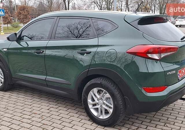 Зелений Хендай Туксон, об'ємом двигуна 2 л та пробігом 218 тис. км за 16999 $, фото 9 на Automoto.ua
