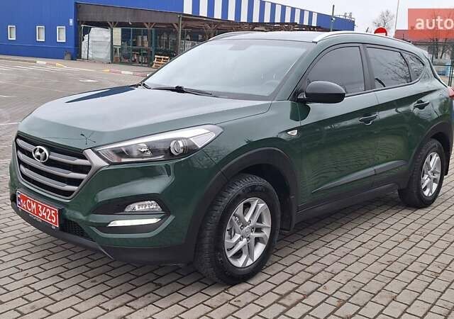 Зелений Хендай Туксон, об'ємом двигуна 2 л та пробігом 218 тис. км за 16999 $, фото 10 на Automoto.ua