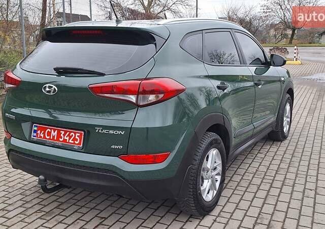 Зелений Хендай Туксон, об'ємом двигуна 2 л та пробігом 218 тис. км за 16999 $, фото 7 на Automoto.ua