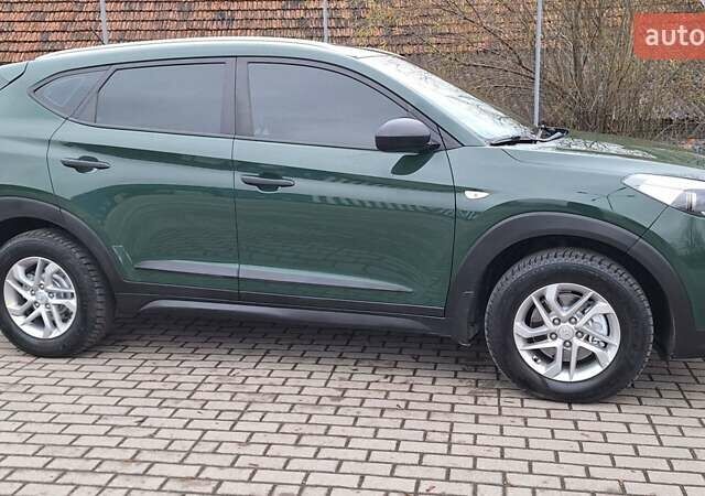 Зелений Хендай Туксон, об'ємом двигуна 2 л та пробігом 218 тис. км за 16999 $, фото 40 на Automoto.ua