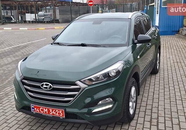 Зелений Хендай Туксон, об'ємом двигуна 2 л та пробігом 218 тис. км за 16999 $, фото 12 на Automoto.ua