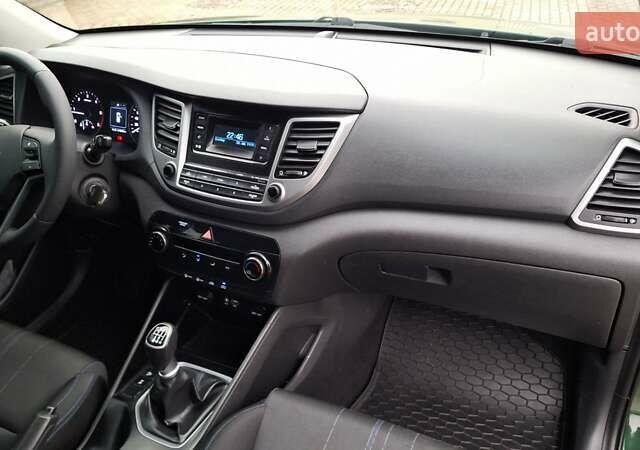 Зелений Хендай Туксон, об'ємом двигуна 2 л та пробігом 218 тис. км за 16999 $, фото 28 на Automoto.ua