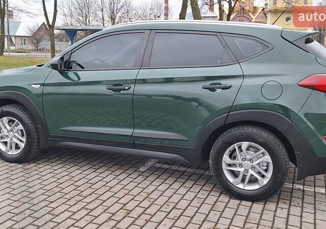 Зелений Хендай Туксон, об'ємом двигуна 2 л та пробігом 218 тис. км за 17300 $, фото 16 на Automoto.ua