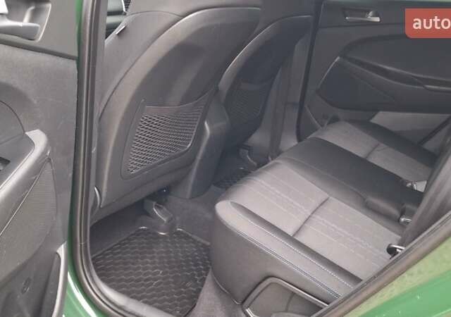 Зелений Хендай Туксон, об'ємом двигуна 2 л та пробігом 218 тис. км за 16999 $, фото 16 на Automoto.ua