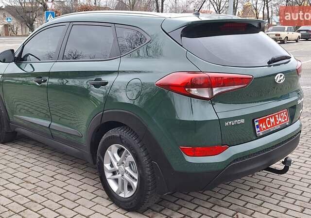Зелений Хендай Туксон, об'ємом двигуна 2 л та пробігом 218 тис. км за 16999 $, фото 8 на Automoto.ua
