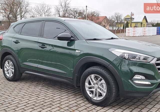 Зелений Хендай Туксон, об'ємом двигуна 2 л та пробігом 218 тис. км за 17300 $, фото 7 на Automoto.ua