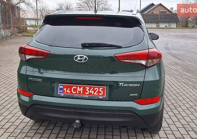 Зелений Хендай Туксон, об'ємом двигуна 2 л та пробігом 218 тис. км за 16999 $, фото 3 на Automoto.ua