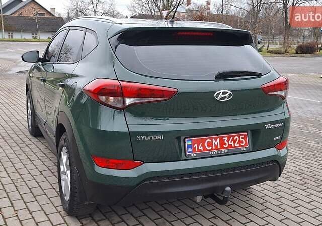 Зелений Хендай Туксон, об'ємом двигуна 2 л та пробігом 218 тис. км за 16999 $, фото 6 на Automoto.ua