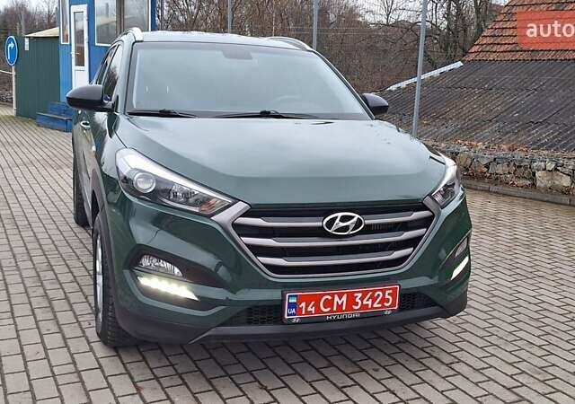 Зелений Хендай Туксон, об'ємом двигуна 2 л та пробігом 218 тис. км за 16999 $, фото 39 на Automoto.ua