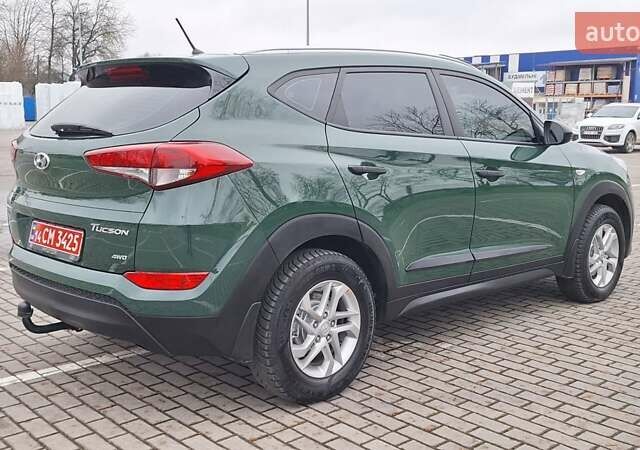 Зелений Хендай Туксон, об'ємом двигуна 2 л та пробігом 218 тис. км за 17300 $, фото 9 на Automoto.ua