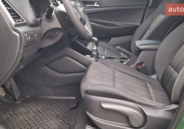 Зелений Хендай Туксон, об'ємом двигуна 2 л та пробігом 218 тис. км за 16999 $, фото 15 на Automoto.ua