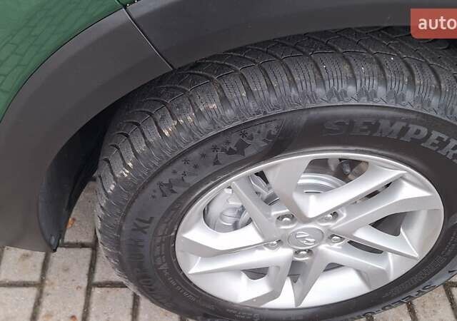 Зелений Хендай Туксон, об'ємом двигуна 2 л та пробігом 218 тис. км за 17300 $, фото 17 на Automoto.ua