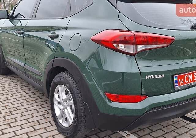 Зелений Хендай Туксон, об'ємом двигуна 2 л та пробігом 218 тис. км за 17300 $, фото 14 на Automoto.ua