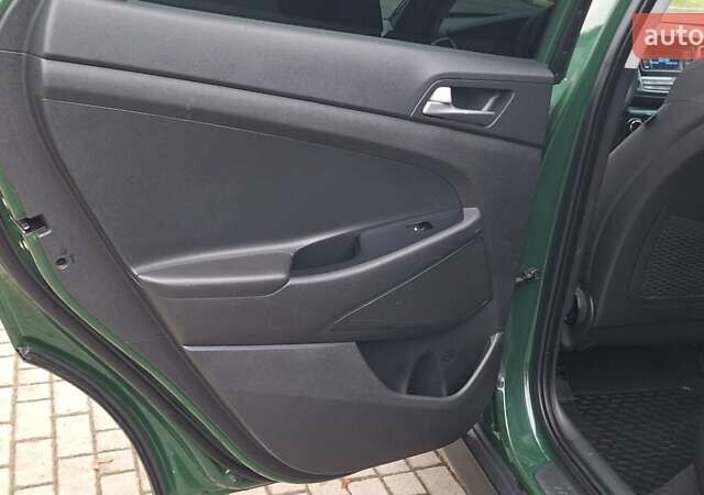 Зелений Хендай Туксон, об'ємом двигуна 2 л та пробігом 218 тис. км за 16999 $, фото 23 на Automoto.ua