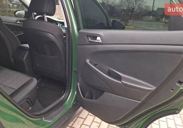 Зелений Хендай Туксон, об'ємом двигуна 2 л та пробігом 218 тис. км за 16999 $, фото 17 на Automoto.ua