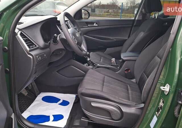 Зелений Хендай Туксон, об'ємом двигуна 2 л та пробігом 218 тис. км за 16999 $, фото 34 на Automoto.ua