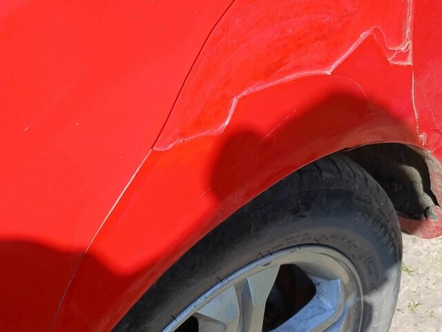 Красный Хендай Тускани, объемом двигателя 0.16 л и пробегом 224 тыс. км за 3800 $, фото 6 на Automoto.ua