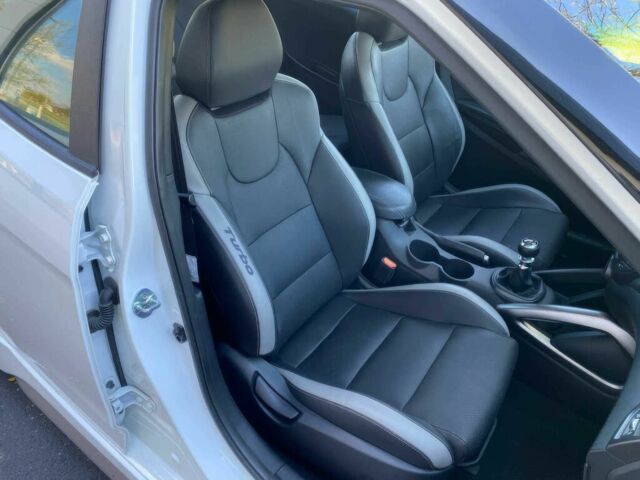 Белый Хендай Велостер, объемом двигателя 1.6 л и пробегом 61 тыс. км за 1650 $, фото 6 на Automoto.ua