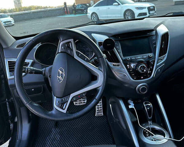 Черный Хендай Велостер, объемом двигателя 1.6 л и пробегом 235 тыс. км за 7400 $, фото 7 на Automoto.ua