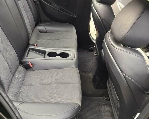 Черный Хендай Велостер, объемом двигателя 1.6 л и пробегом 201 тыс. км за 8600 $, фото 4 на Automoto.ua