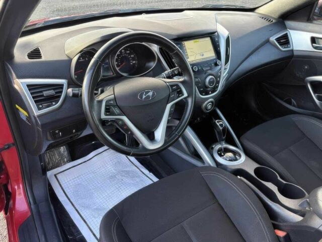 Красный Хендай Велостер, объемом двигателя 1.6 л и пробегом 61 тыс. км за 5300 $, фото 6 на Automoto.ua