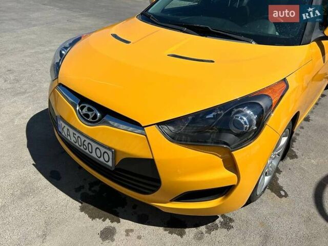 Желтый Хендай Велостер, объемом двигателя 1.59 л и пробегом 220 тыс. км за 8500 $, фото 6 на Automoto.ua