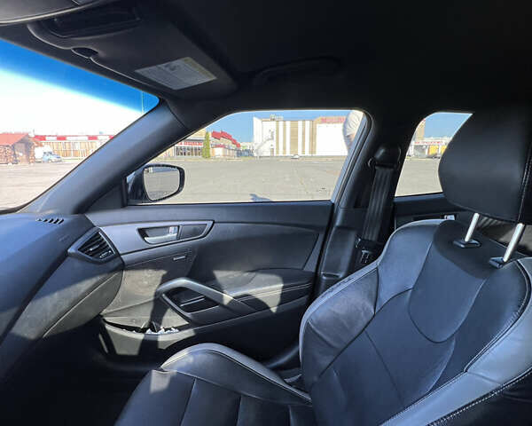 Серый Хендай Велостер, объемом двигателя 1.59 л и пробегом 143 тыс. км за 10990 $, фото 8 на Automoto.ua