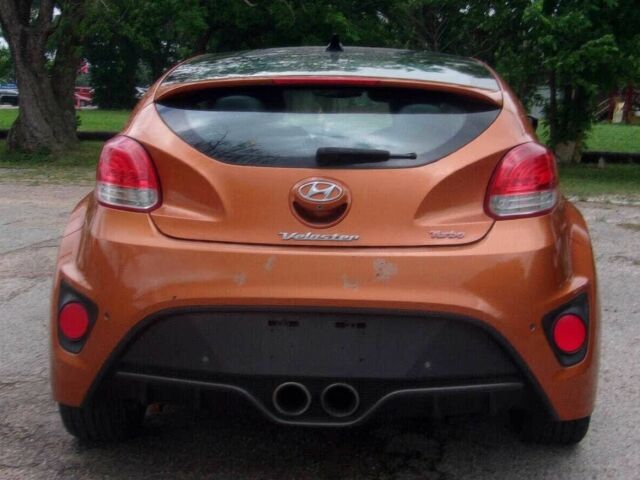 Оранжевый Хендай Велостер, объемом двигателя 1.6 л и пробегом 76 тыс. км за 2500 $, фото 5 на Automoto.ua