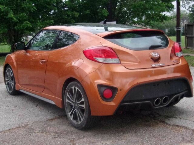 Оранжевый Хендай Велостер, объемом двигателя 1.6 л и пробегом 76 тыс. км за 2500 $, фото 6 на Automoto.ua