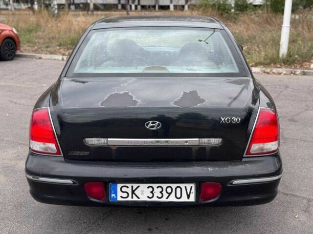 Чорний Хендай КСГ, об'ємом двигуна 1.6 л та пробігом 250 тис. км за 1650 $, фото 6 на Automoto.ua