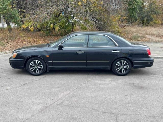 Чорний Хендай КСГ, об'ємом двигуна 1.6 л та пробігом 250 тис. км за 1650 $, фото 3 на Automoto.ua