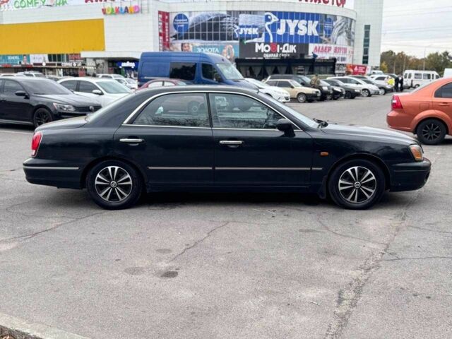 Чорний Хендай КСГ, об'ємом двигуна 1.6 л та пробігом 250 тис. км за 1650 $, фото 4 на Automoto.ua