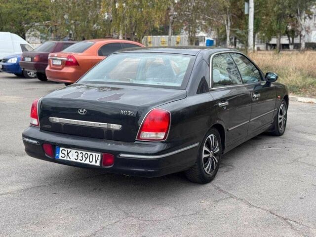 Чорний Хендай КСГ, об'ємом двигуна 1.6 л та пробігом 250 тис. км за 1650 $, фото 7 на Automoto.ua