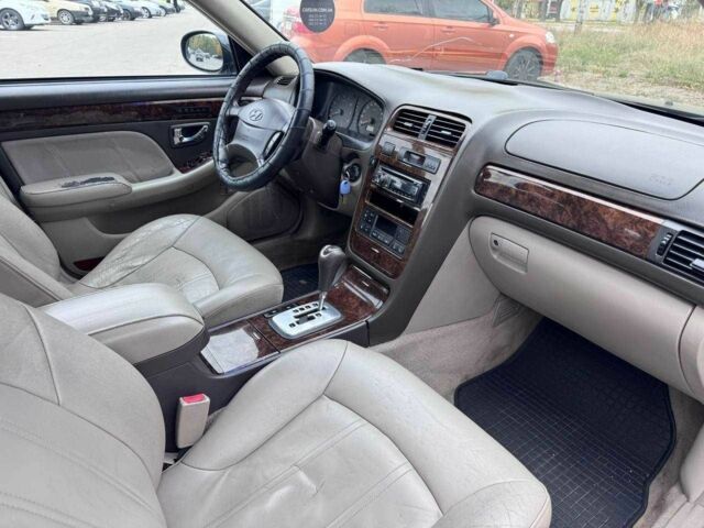 Чорний Хендай КСГ, об'ємом двигуна 1.6 л та пробігом 250 тис. км за 1650 $, фото 9 на Automoto.ua