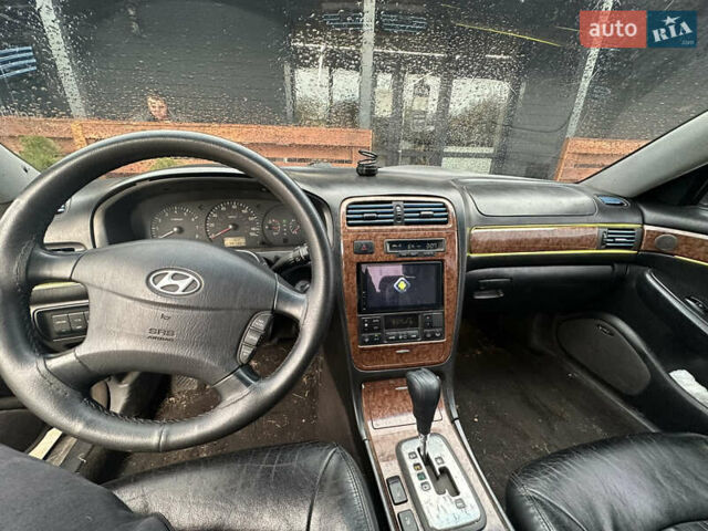 Черный Хендай КСГ, объемом двигателя 3.5 л и пробегом 356 тыс. км за 2999 $, фото 6 на Automoto.ua