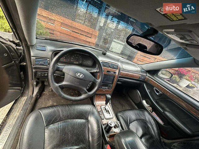 Черный Хендай КСГ, объемом двигателя 3.5 л и пробегом 356 тыс. км за 2999 $, фото 8 на Automoto.ua