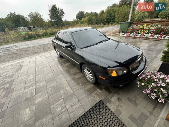 Черный Хендай КСГ, объемом двигателя 3.5 л и пробегом 356 тыс. км за 2999 $, фото 1 на Automoto.ua