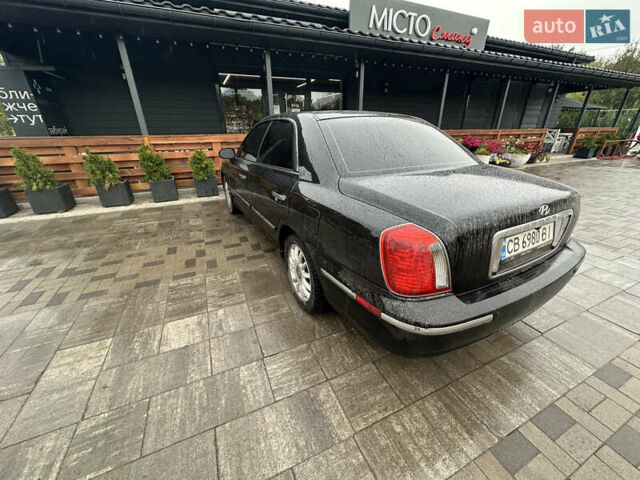 Черный Хендай КСГ, объемом двигателя 3.5 л и пробегом 356 тыс. км за 2999 $, фото 4 на Automoto.ua