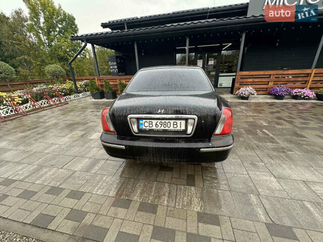 Черный Хендай КСГ, объемом двигателя 3.5 л и пробегом 356 тыс. км за 2999 $, фото 3 на Automoto.ua