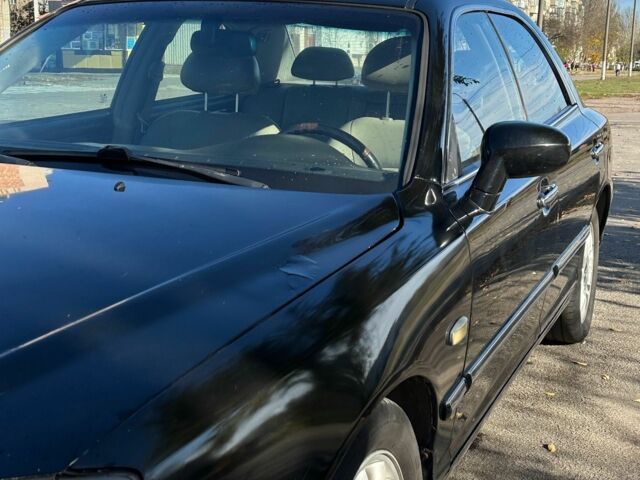 Чорний Хендай КСГ, об'ємом двигуна 3.5 л та пробігом 322 тис. км за 4000 $, фото 6 на Automoto.ua