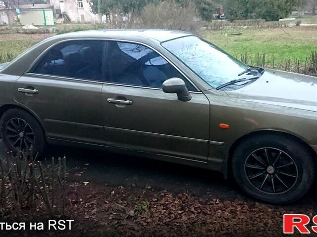 Зелений Хендай КСГ, об'ємом двигуна 3 л та пробігом 240 тис. км за 2300 $, фото 4 на Automoto.ua