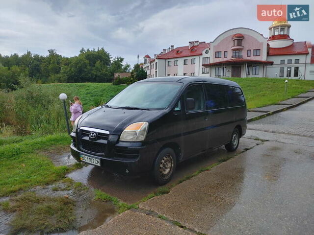 Черный Хендай H-1, объемом двигателя 2.47 л и пробегом 280 тыс. км за 8500 $, фото 5 на Automoto.ua