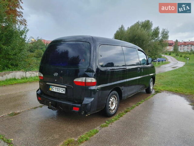 Черный Хендай H-1, объемом двигателя 2.47 л и пробегом 280 тыс. км за 8500 $, фото 17 на Automoto.ua