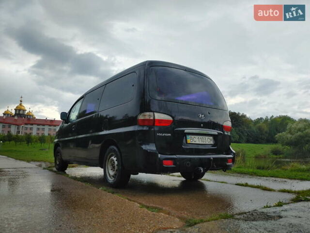 Черный Хендай H-1, объемом двигателя 2.47 л и пробегом 280 тыс. км за 8500 $, фото 24 на Automoto.ua