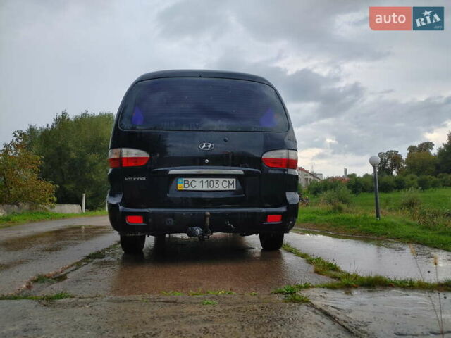 Черный Хендай H-1, объемом двигателя 2.47 л и пробегом 280 тыс. км за 8500 $, фото 21 на Automoto.ua